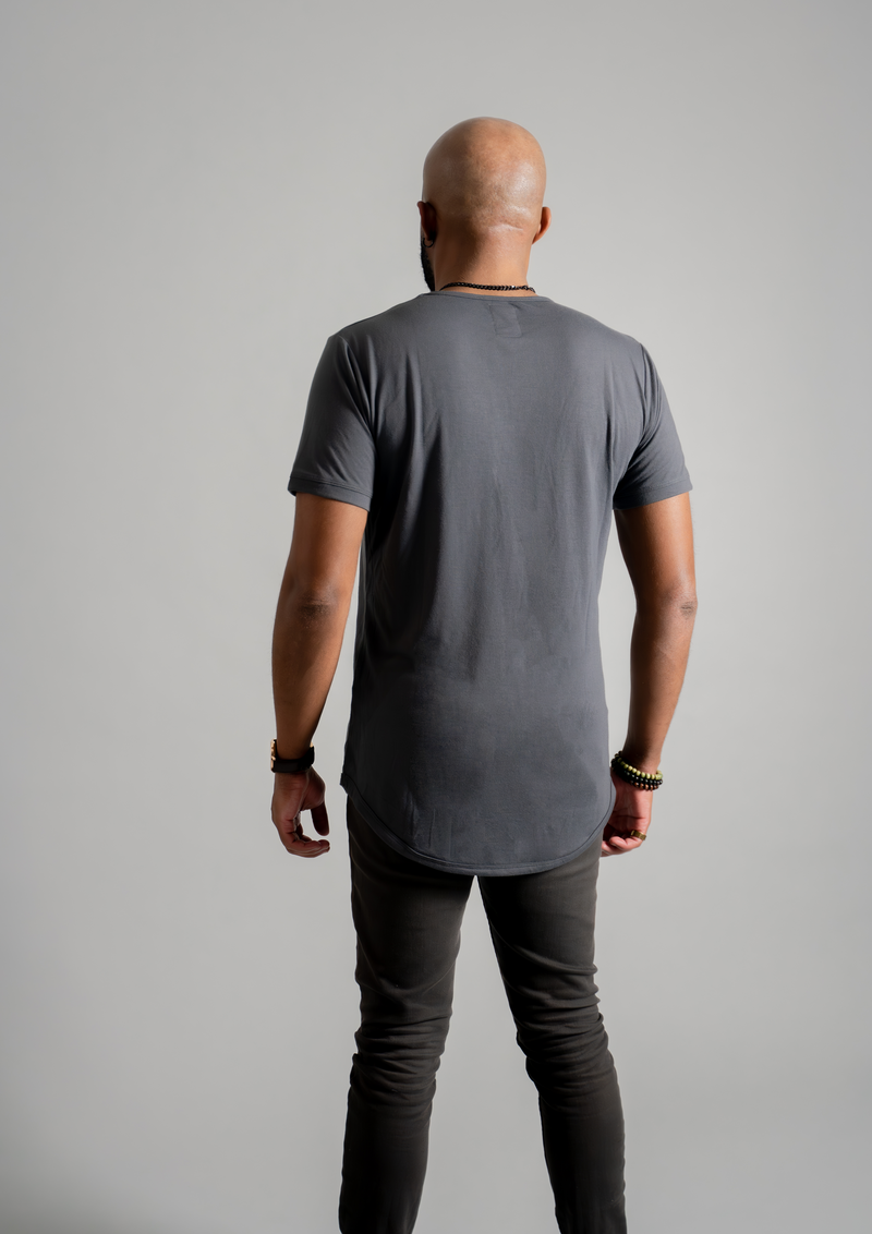 Male model in a dark grey color curved hem men's t shirt from Ten 10 apparel