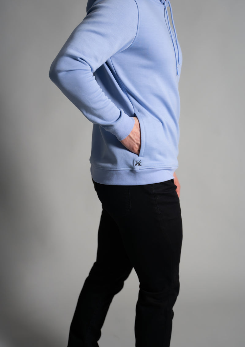cortex hoodie mist light blue showing logo by right side pocket