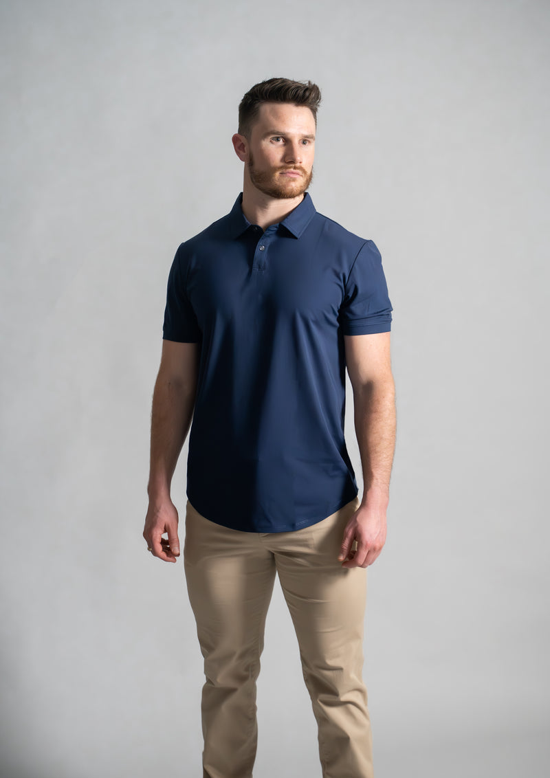 Front view of male model in dark oxford blue men's polo