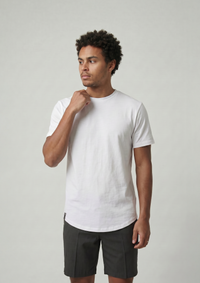 Man holding neck collar of White heritage ultra premium curved hem crew neck t shirt from ten10 apparel