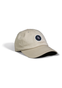 Desert oak beige colored free structured dad hat product shot showing lighting shadows
