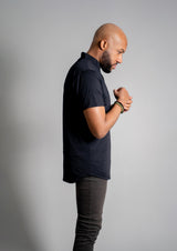 Model in a men's Ares Mock Neck Polo from Ten 10 apparel