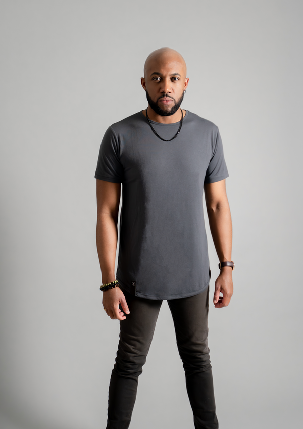Charcoal dark grey shirt from Ten10 Apparel with male model facing forward. Wearing a black chain, modern watch, and minimalist bracelet