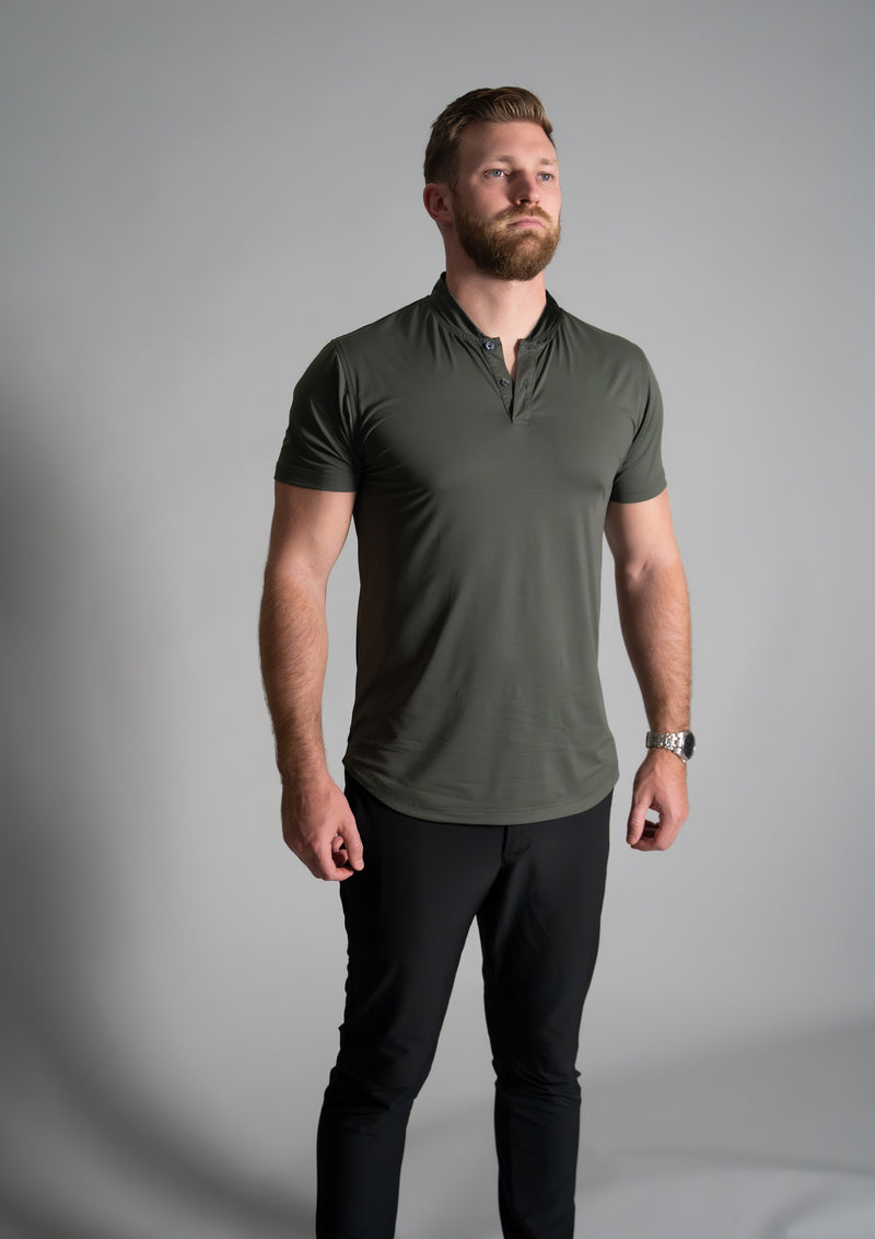 Mens dark green mock neck polo from Ten out of ten 10 apparel with male model facing forward