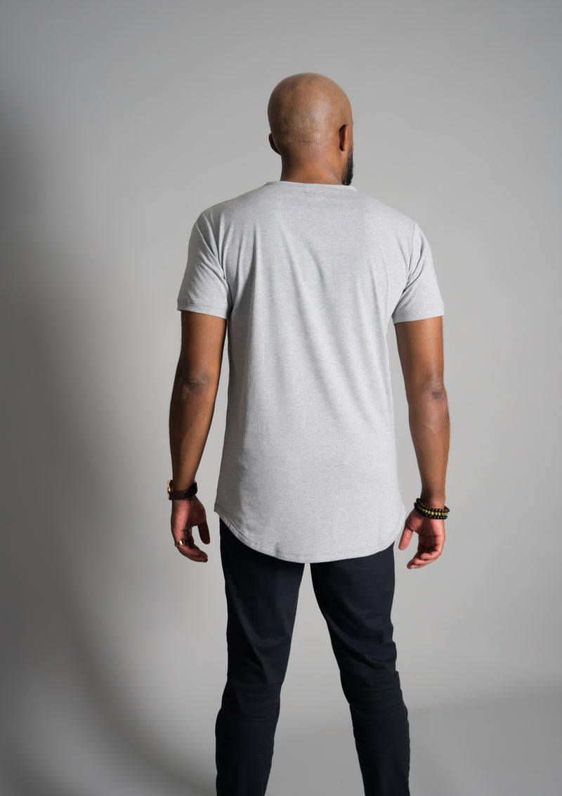 back view of a male model in a curved hemline t-shirt from Ten10 apparel