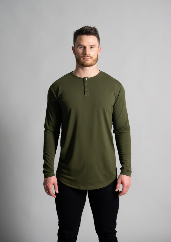 Male model in a long sleeve fitted green henley from ten10 apparel