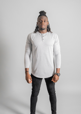 Male model in a heather are long sleeve henley from Ten 10 apparel