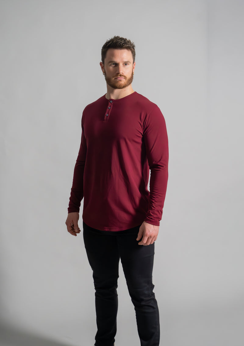 Mahogany long sleeve henley from Ten10 apparel, with male model that has a muscular build