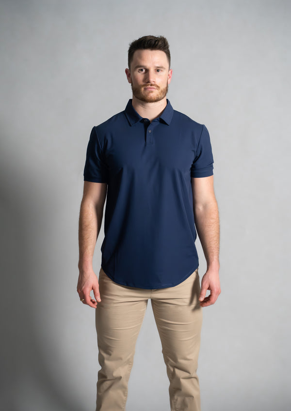 Model in dark blue stratus polo from ten10 apparel