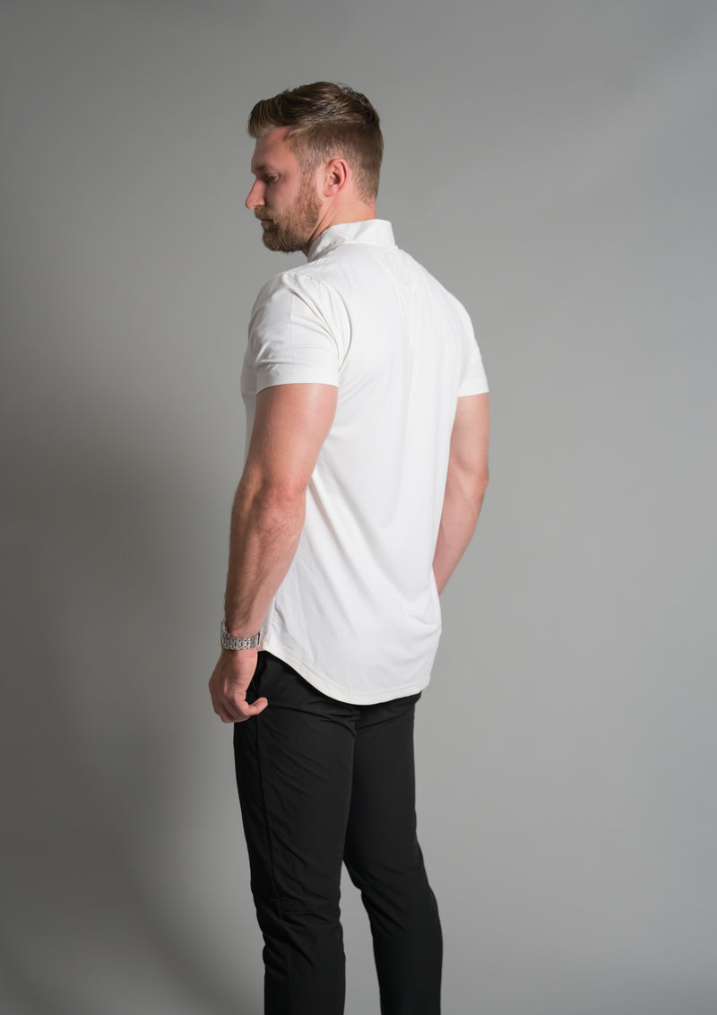 Back of mock neck ares polo in white, model facing away from the camera