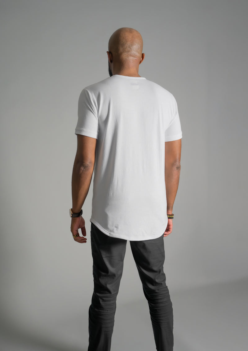 Back view of male model in mens white henley curved bottom hemline shirt