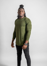 Model in mens dark green long sleeve with a round bottom hem line