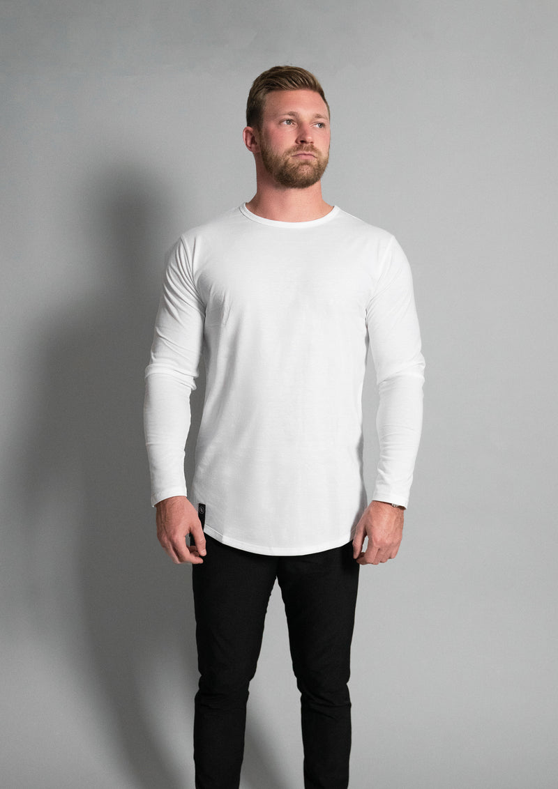 Male model wearing a long sleeve round bottom shirt from Ten10 apparel