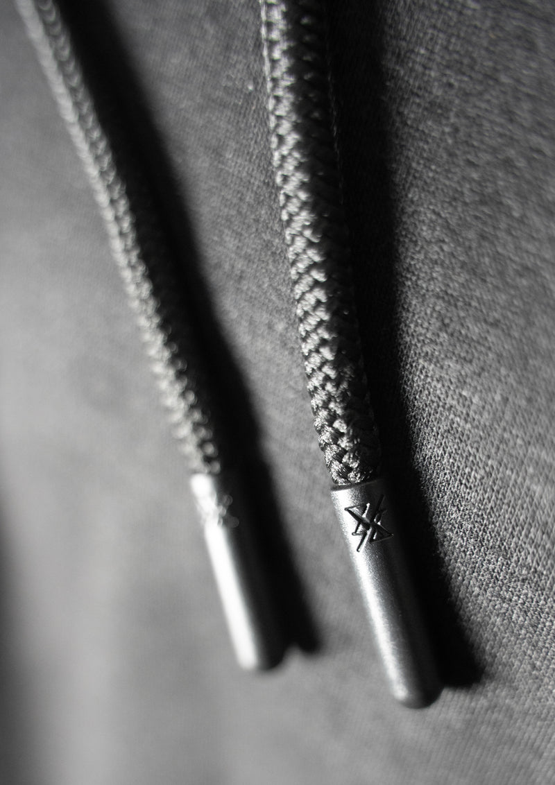 black hoodie strings with Ten10 brand logo