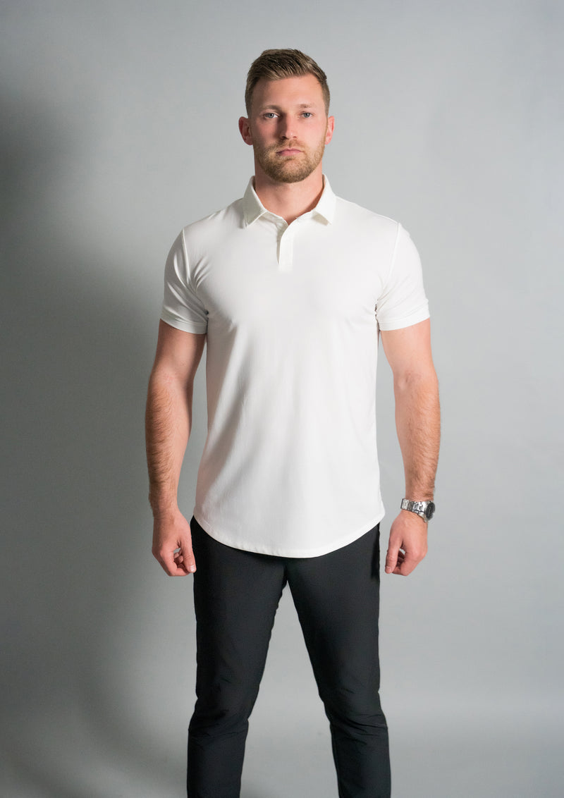 Male model in a white polo that include 2 buttons and equal spacing in the neck