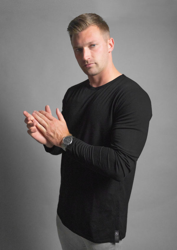 Male model in tri-blend Kano Long sleeve crew neck shirt with a straight bottom from Ten10 apparel