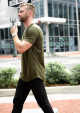side view of mens dark green color shirt for males walking downtown from Ten out of ten clothing