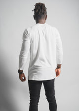 Male model with a white split hem long sleeve shirt with a back view to show back contours