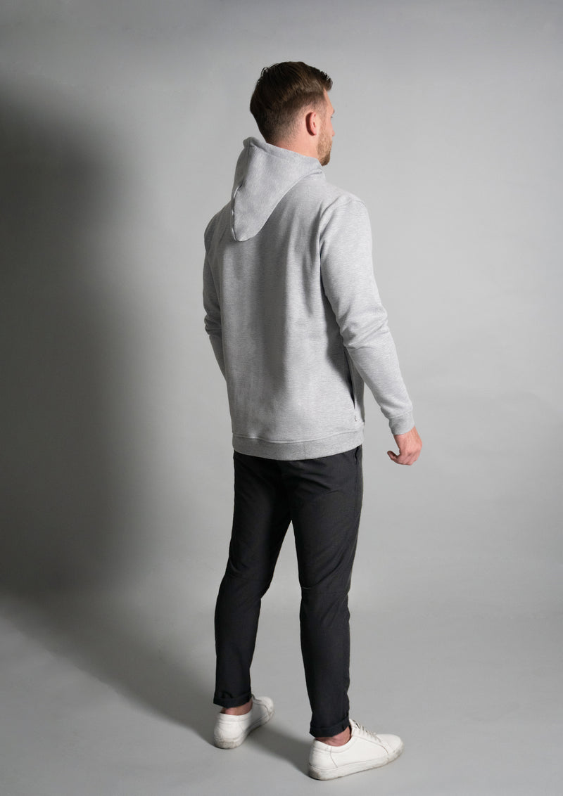 Male model in heather grey cortex hoodie from Ten/10 apparel