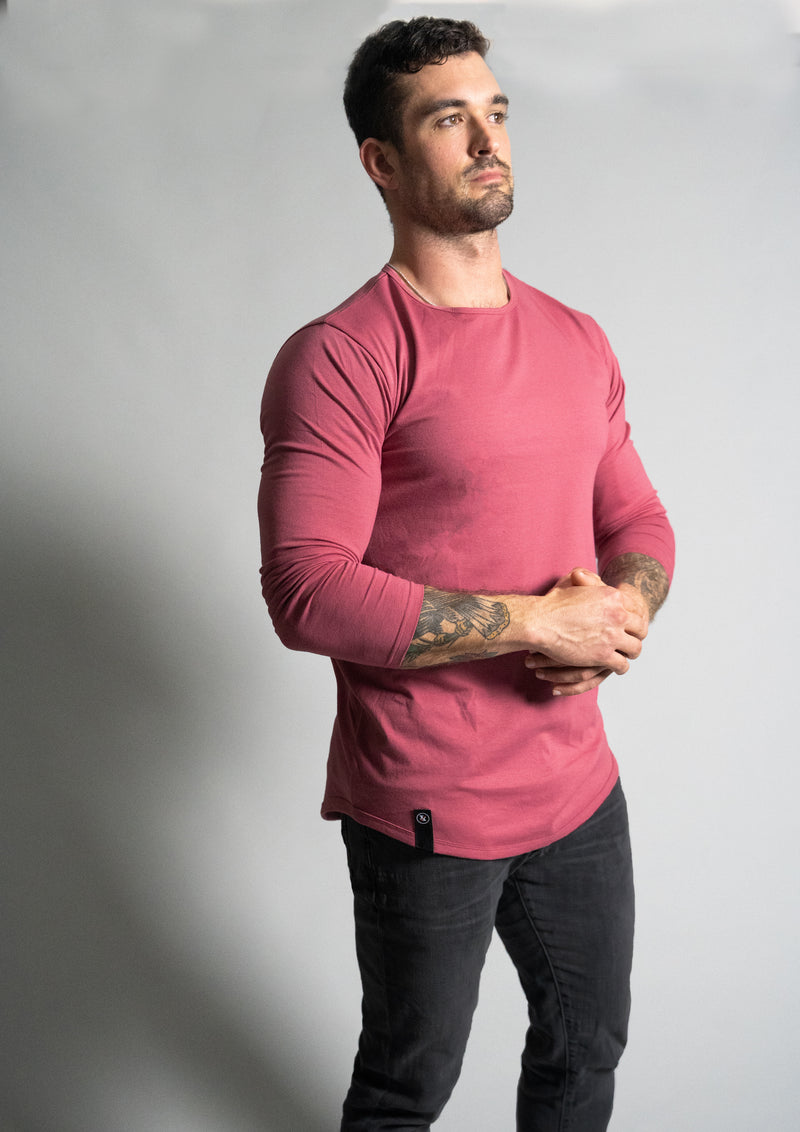 Front view of Ten10 Apparel Rosewood long sleeve shirt with male model in the shirt. This is a darker washed pink color
